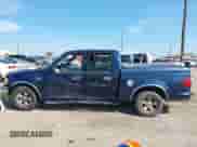 2003 Ford F-150 XLT z VIN 1FTRW07663KD61130, wystawiony jako IAAI lot #43331769 z przebiegiem 161 343 mil mil oraz . Historia ofert i sprzedaży dostępna na DreamBid. Obrazek 15.