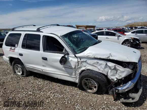 2000 Dodge Durango with VIN 1B4HS28Z6YF202195, listed as a Copart auction lot 55115865 with 183,507 mi miles and Salvage title. Bid and sale history available at DreamBid. Image 4.