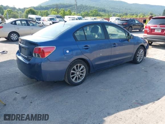 2012 Subaru Impreza Premium with VIN JF1GJAC62CH023339, listed as a IAAI auction lot 42479817 with 120,605 mi miles and . Bid and sale history available at DreamBid. Image 4.