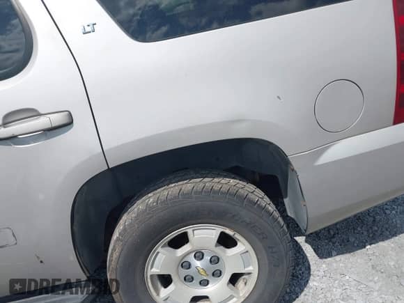 2007 Chevrolet Tahoe LTZ z VIN 1GNFK13077R132501, wystawiony jako IAAI lot #43162107 z przebiegiem Nie podano mil oraz . Historia ofert i sprzedaży dostępna na DreamBid. Obrazek 13.