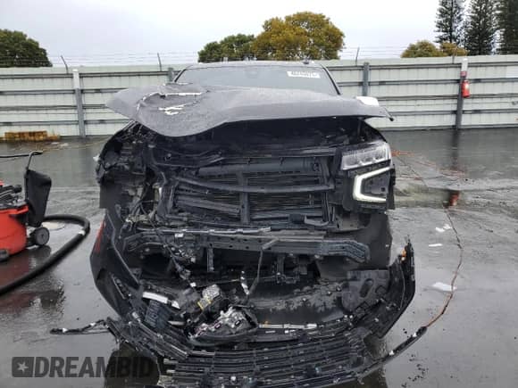 2021 Chevrolet Suburban Premier с VIN 1GNSKFKD1MR338361, выставлен на аукционе Copart как лот 46243075 с пробегом 78 116 миль миль и Списание • Salvage title. История ставок и продаж доступна на DreamBid. Изображение 5.