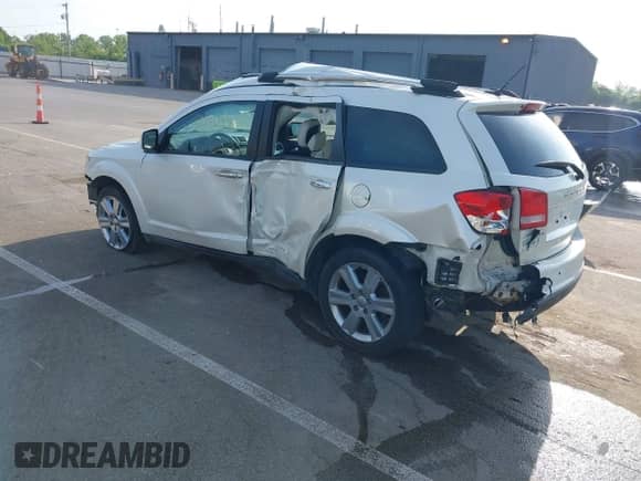 2013 Dodge Journey Crew with VIN 3C4PDDDG5DT567654, listed as a IAAI auction lot 42561948 with 158,434 mi miles and . Bid and sale history available at DreamBid. Image 3.