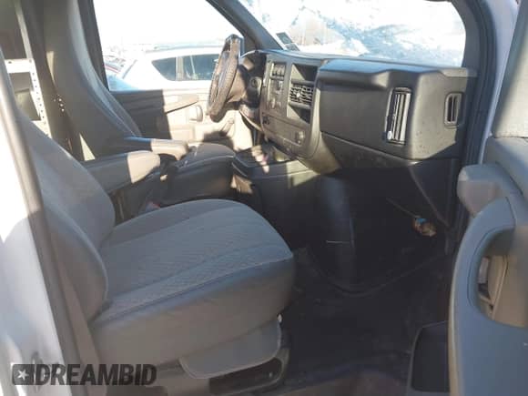 2012 Chevrolet Express Cargo with VIN 1GCWGGBA0C1100411, listed as a IAAI auction lot 41024219 with 197,251 mi miles and . Bid and sale history available at DreamBid. Image 5.