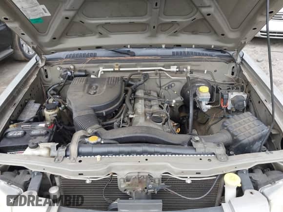 2003 Nissan Frontier XE z VIN 1N6DD26T93C408967, wystawiony jako IAAI lot #41496701 z przebiegiem 181 111 mil mil oraz . Historia ofert i sprzedaży dostępna na DreamBid. Obrazek 10.