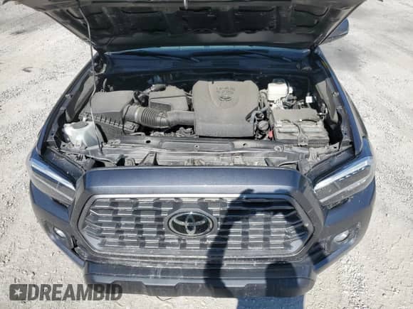 2023 Toyota Tacoma SR5 with VIN 3TYDZ5BNXPT036528, listed as a Copart auction lot 80371305 with 34,561 mi miles and Salvage title. Bid and sale history available at DreamBid. Image 11.