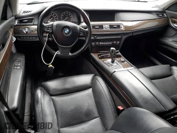 2009 BMW 7 Series 750Li with VIN WBAKB835X9CY57752, listed as a Copart auction lot 67517575 with 111,522 mi miles and Salvage title. Bid and sale history available at DreamBid. Image 8.