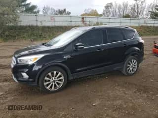 2017 Ford Escape Titanium with VIN 1FMCU0JD9HUE22755, listed as a Copart auction lot 87491745 with 158,322 mi miles and Clean title. Bid and sale history available at DreamBid. Image 1.