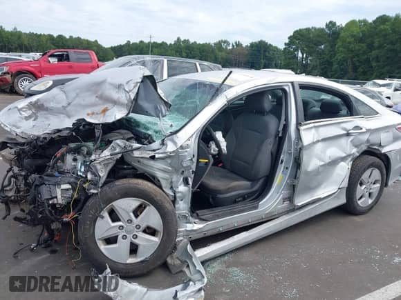 2012 Hyundai Sonata Hybrid z VIN KMHEC4A43CA031162, wystawiony jako IAAI lot #43080478 z przebiegiem 133 578 mil mil oraz . Historia ofert i sprzedaży dostępna na DreamBid. Obrazek 6.