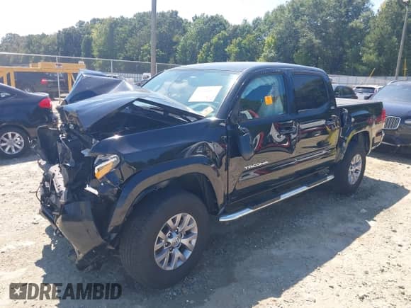 2019 Toyota Tacoma SR5 with VIN 3TMAZ5CN5KM082418, listed as a IAAI auction lot 43185032 with 73,994 mi miles and . Bid and sale history available at DreamBid. Image 6.
