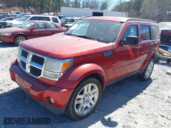 2010 Dodge Nitro SE with VIN 1D4PT2GK7AW142856, listed as a IAAI auction lot 41855687 with 197,248 mi miles and . Bid and sale history available at DreamBid. Image 2.