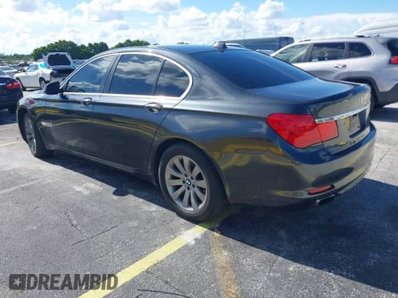 2011 BMW 7 Series 750i xDrive with VIN WBAKC6C51BC395119, listed as a IAAI auction lot 42973911 with 134,646 mi miles and . Bid and sale history available at DreamBid. Image 3.