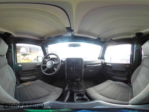 2007 Jeep Wrangler Unlimited Sahara z VIN 1J4GA59107L120503, wystawiony jako IAAI lot #42019384 z przebiegiem 230 965 mil mil oraz . Historia ofert i sprzedaży dostępna na DreamBid. Obrazek 19.