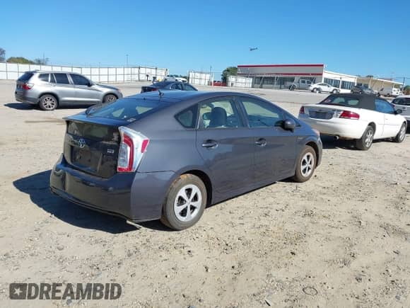 2015 Toyota Prius Persona Series z VIN JTDKN3DU9F0451820, wystawiony jako IAAI lot #43391560 z przebiegiem 169 076 mil mil oraz . Historia ofert i sprzedaży dostępna na DreamBid. Obrazek 4.