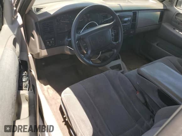 2001 Dodge Dakota с VIN 1B7GL22X61S284459, выставлен на аукционе Copart как лот 65877245 с пробегом 239 965 миль миль и Списание • Salvage title. История ставок и продаж доступна на DreamBid. Изображение 8.