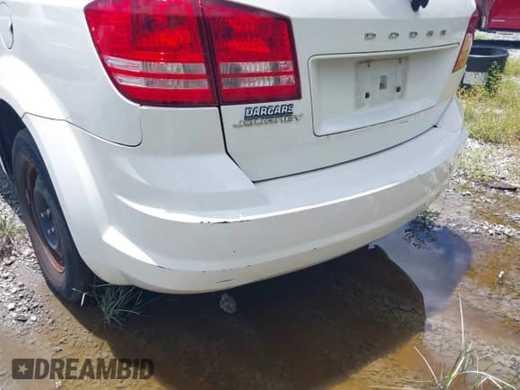 2012 Dodge Journey SE z VIN 3C4PDCABXCT255928, wystawiony jako IAAI lot #42536508 z przebiegiem 148 167 mil mil oraz . Historia ofert i sprzedaży dostępna na DreamBid. Obrazek 6.