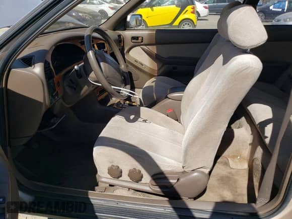 1995 Toyota Camry z VIN 4T1GK12C9SU097485, wystawiony jako Copart lot #61669585 z przebiegiem 199 965 mil mil oraz Szkoda całkowita • Salvage title. Historia ofert i sprzedaży dostępna na DreamBid. Obrazek 7.