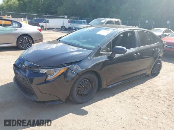 2020 Toyota Corolla L with VIN 5YFDPRAE2LP011894, listed as a IAAI auction lot 43112636 with 85,621 mi miles and . Bid and sale history available at DreamBid. Image 2.