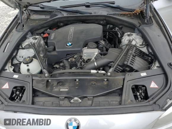 2014 BMW 5 Series 528i z VIN WBA5A5C57ED505411, wystawiony jako Copart lot #69820495 z przebiegiem 134 131 mil mil oraz Szkoda całkowita • Salvage title. Historia ofert i sprzedaży dostępna na DreamBid. Obrazek 11.