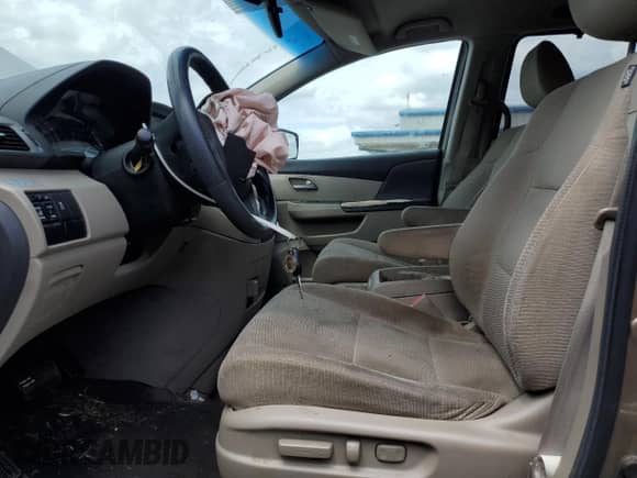 2012 Honda Odyssey EX with VIN 5FNRL5H48CB106771, listed as a Copart auction lot 69810795 with 140,290 mi miles and Salvage title. Bid and sale history available at DreamBid. Image 7.