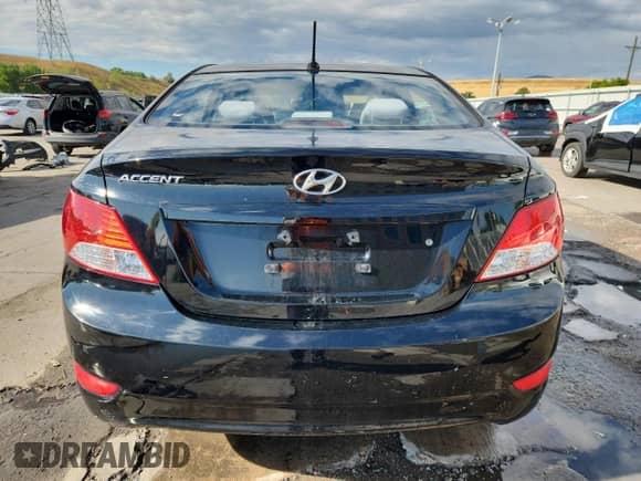 2012 Hyundai Accent GLS z VIN KMHCT4AE0CU062657, wystawiony jako Copart lot #70486255 z przebiegiem 100 059 mil mil oraz Szkoda całkowita • Salvage title. Historia ofert i sprzedaży dostępna na DreamBid. Obrazek 6.