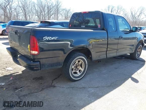 2003 Ford F-150 XL with VIN 1FTRX17293NB00122, listed as a IAAI auction lot 41694760 with 222,241 mi miles and . Bid and sale history available at DreamBid. Image 4.