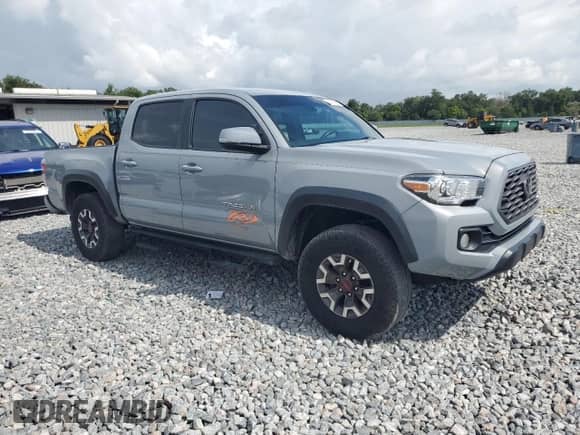 2021 Toyota Tacoma SR5 with VIN 3TMAZ5CN9MM148312, listed as a Copart auction lot 63611885 with 95,209 mi miles and Salvage title. Bid and sale history available at DreamBid. Image 4.