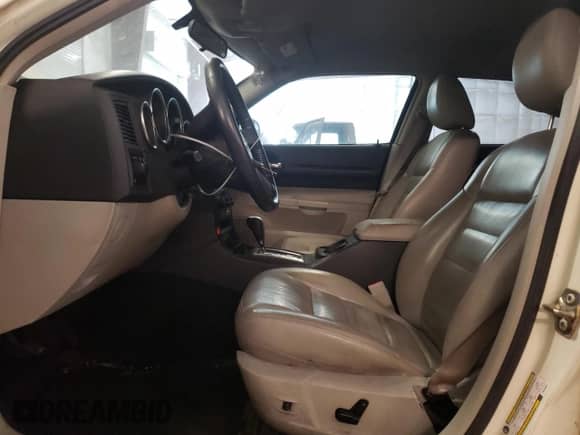 2005 Dodge Magnum SE with VIN 2D4FV48V15H534049, listed as a Copart auction lot 84053585 with 197,213 mi miles and Salvage title. Bid and sale history available at DreamBid. Image 7.