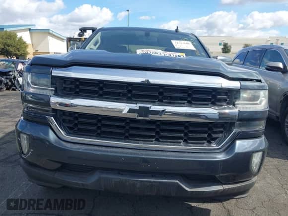 2017 Chevrolet Silverado 1500 LT with VIN 1GCRCREC4HZ367089, listed as a IAAI auction lot 41592108 with 108,133 mi miles and . Bid and sale history available at DreamBid. Image 13.