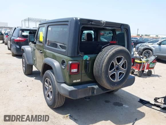 2023 Jeep Wrangler Sport with VIN 1C4HJXAG1PW650435, listed as a IAAI auction lot 42333006 with 16,980 mi miles and . Bid and sale history available at DreamBid. Image 3.