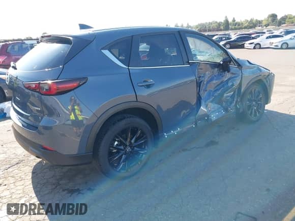 2025 Mazda CX-5 S Carbon Edition z VIN JM3KFBCM0S0575730, wystawiony jako IAAI lot #42685414 z przebiegiem Nie podano mil oraz . Historia ofert i sprzedaży dostępna na DreamBid. Obrazek 4.