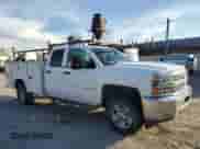 2015 Chevrolet Silverado 2500HD with VIN 1GB2KUEG6FZ506442, listed as a Copart auction lot 46435745 with 219,813 mi miles and Salvage title. Bid and sale history available at DreamBid. Image 4.