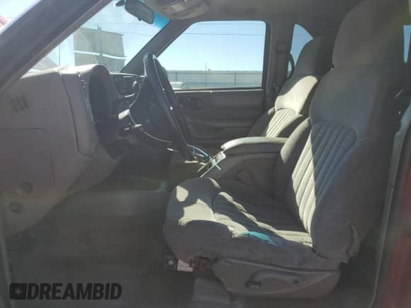 2001 Chevrolet Blazer LS с VIN 1GNCT18W61K145060, выставлен на аукционе Copart как лот 71013154 с пробегом 223 041 миль миль и Списание • Salvage title. История ставок и продаж доступна на DreamBid. Изображение 7.