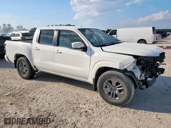 2025 Nissan Frontier Pro-X with VIN 1N6ED1EJ9SN607017, listed as a Copart auction lot 85093005 with 50 mi miles and Salvage title. Bid and sale history available at DreamBid. Image 4.