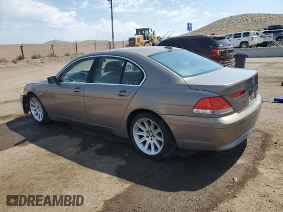 2002 BMW 7 Series 745i with VIN WBAGL634X2DP59674, listed as a Copart auction lot 69068845 with 190,469 mi miles and Salvage title. Bid and sale history available at DreamBid. Image 2.