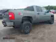 2011 Chevrolet Silverado 1500 LT with VIN 3GCPKSE36BG142049, listed as a IAAI auction lot 43304595 with 175,136 mi miles and . Bid and sale history available at DreamBid. Image 4.