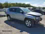 2014 Jeep Compass Latitude with VIN 1C4NJDEB8ED827099, listed as a Copart auction lot 71846995 with 77,981 mi miles and Salvage title. Bid and sale history available at DreamBid. Image 4.