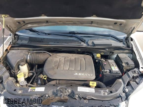 2013 Dodge Grand Caravan SXT z VIN 2C4RDGCG6DR580721, wystawiony jako IAAI lot #43040666 z przebiegiem 206 777 mil mil oraz . Historia ofert i sprzedaży dostępna na DreamBid. Obrazek 10.