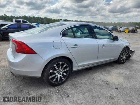 2014 Volvo S60 T5 z VIN YV1612FH9E2281186, wystawiony jako Copart lot #64036615 z przebiegiem 131 992 mil mil oraz Szkoda całkowita • Salvage title. Historia ofert i sprzedaży dostępna na DreamBid. Obrazek 3.