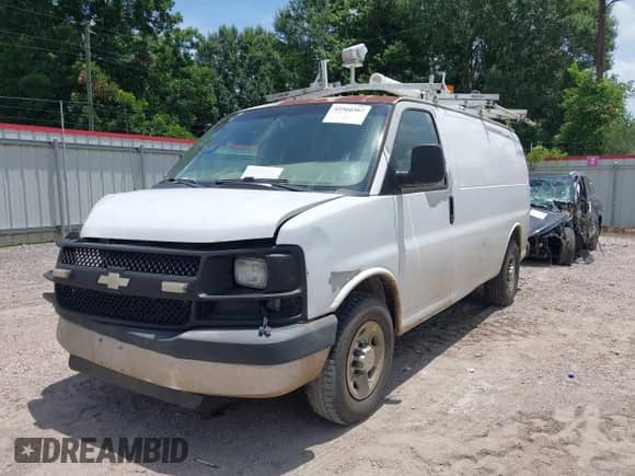 2011 Chevrolet Express Cargo with VIN 1GCWGFBAXB1174864, listed as a IAAI auction lot 42560387 with 187,732 mi miles and . Bid and sale history available at DreamBid. Image 2.