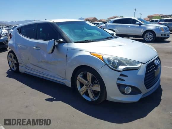 2013 Hyundai Veloster Turbo с VIN KMHTC6AE0DU177983, выставлен на аукционе IAAI как лот 42292102 с пробегом 121 142 миль миль и . История ставок и продаж доступна на DreamBid. Изображение 1.