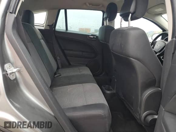 2011 Dodge Caliber Mainstreet with VIN 1B3CB3HA2BD255221, listed as a Copart auction lot 57292345 with 68,568 mi miles and Salvage title. Bid and sale history available at DreamBid. Image 10.