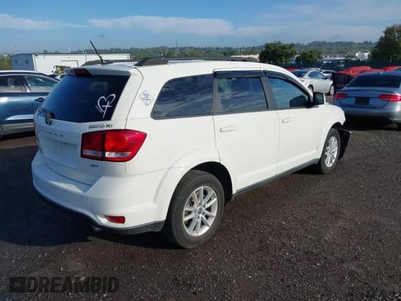 2014 Dodge Journey SXT with VIN 3C4PDDBG6ET108489, listed as a IAAI auction lot 43312286 with 175,213 mi miles and . Bid and sale history available at DreamBid. Image 4.