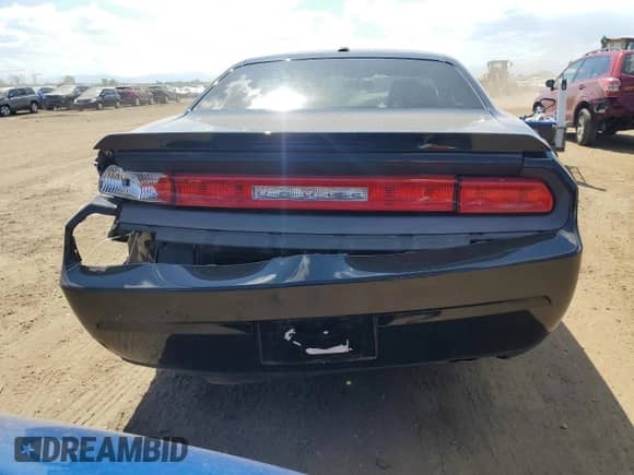 2012 Dodge Challenger R/T z VIN 2C3CDYBT5CH144395, wystawiony jako Copart lot #60336105 z przebiegiem 58 920 mil mil oraz Szkoda całkowita • Salvage title. Historia ofert i sprzedaży dostępna na DreamBid. Obrazek 6.