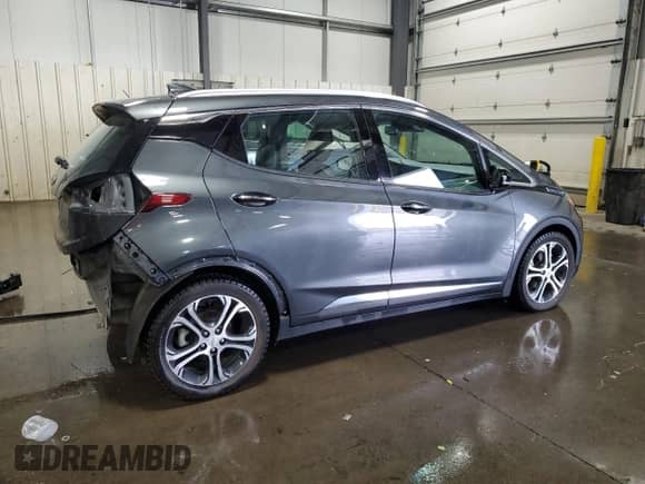 2018 Chevrolet Bolt EV Premier с VIN 1G1FX6S04J4108808, выставлен на аукционе Copart как лот 82117425 с пробегом 54 651 миль миль и Списание • Salvage title. История ставок и продаж доступна на DreamBid. Изображение 3.