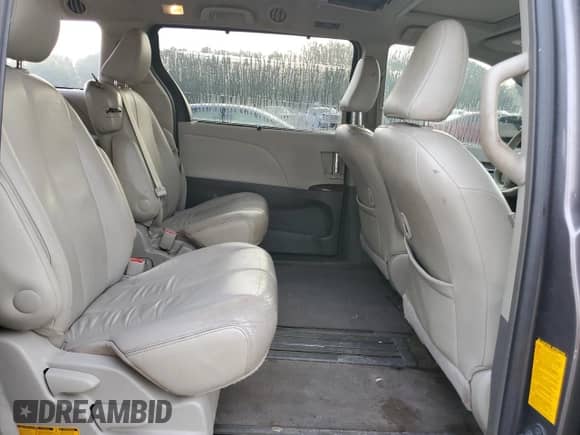 2013 Toyota Sienna XLE with VIN 5TDYK3DC6DS339898, listed as a Copart auction lot 84268565 with 239,128 mi miles and Salvage title. Bid and sale history available at DreamBid. Image 11.