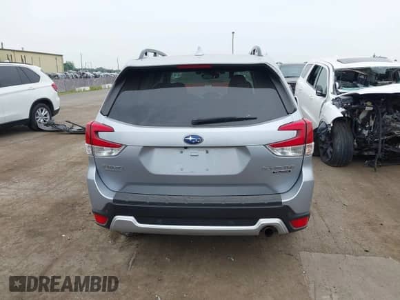 2020 Subaru Forester Touring with VIN JF2SKAXCXLH494092, listed as a IAAI auction lot 42504297 with 83,051 mi miles and . Bid and sale history available at DreamBid. Image 16.