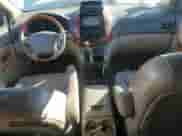 2006 Toyota Sienna XLE Limited z VIN 5TDZA22C16S411890, wystawiony jako Copart lot #82412005 z przebiegiem 187 414 mil mil oraz Szkoda całkowita • Salvage title. Historia ofert i sprzedaży dostępna na DreamBid. Obrazek 8.