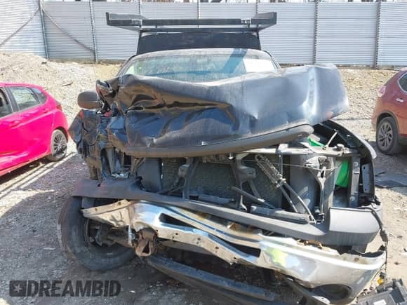 2012 GMC Sierra 1500 Work Truck z VIN 1GTN1TEX9CZ285274, wystawiony jako IAAI lot #41786566 z przebiegiem Nie podano mil oraz . Historia ofert i sprzedaży dostępna na DreamBid. Obrazek 12.