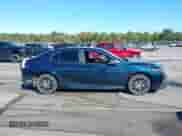 2021 Toyota Camry SE z VIN 4T1T11AK2MU599364, wystawiony jako IAAI lot #43469563 z przebiegiem 69 703 mil mil oraz . Historia ofert i sprzedaży dostępna na DreamBid. Obrazek 13.