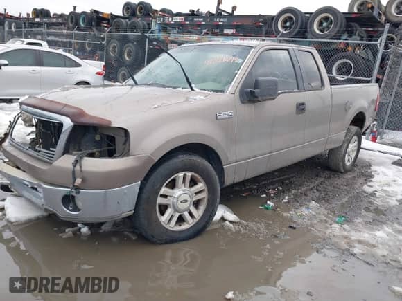 2005 Ford F-150 STX with VIN 1FTRX12W25NA07049, listed as a IAAI auction lot 41354644 with 338,811 mi miles and . Bid and sale history available at DreamBid. Image 2.
